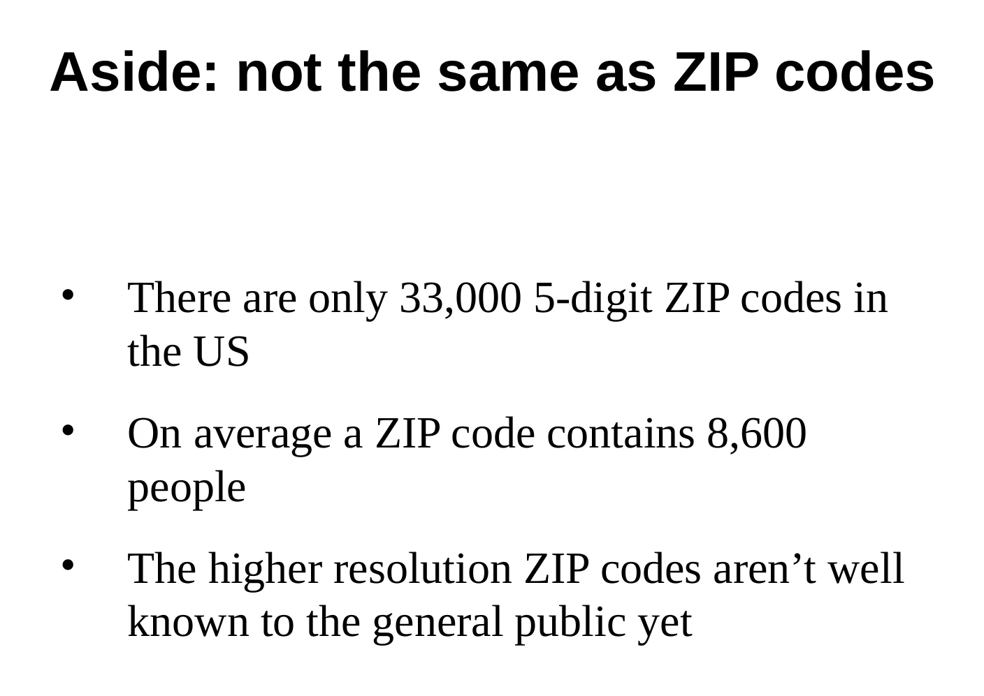 A slide comparing precise UK postcodes with the much larger five-digit ZIP-code areas used in the United States.