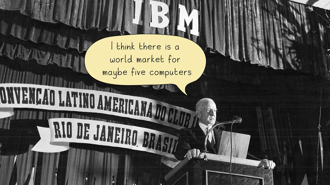 Thomas Watson speaking at an IBM event, with his alleged prediction shown in a speech bubble.
